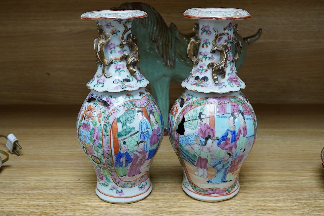 A pair of Chinese famille rose vases, two Canton plates and a green glazed horse, largest 29cm wide